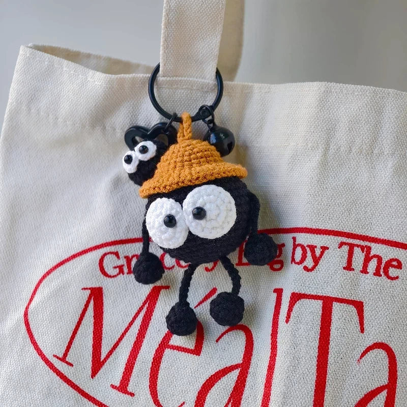 Gehäkelter „Black Coal Ball“ Taschenanhänger