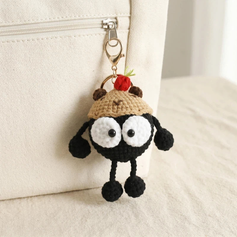 Gehäkelter „Black Coal Ball“ Taschenanhänger