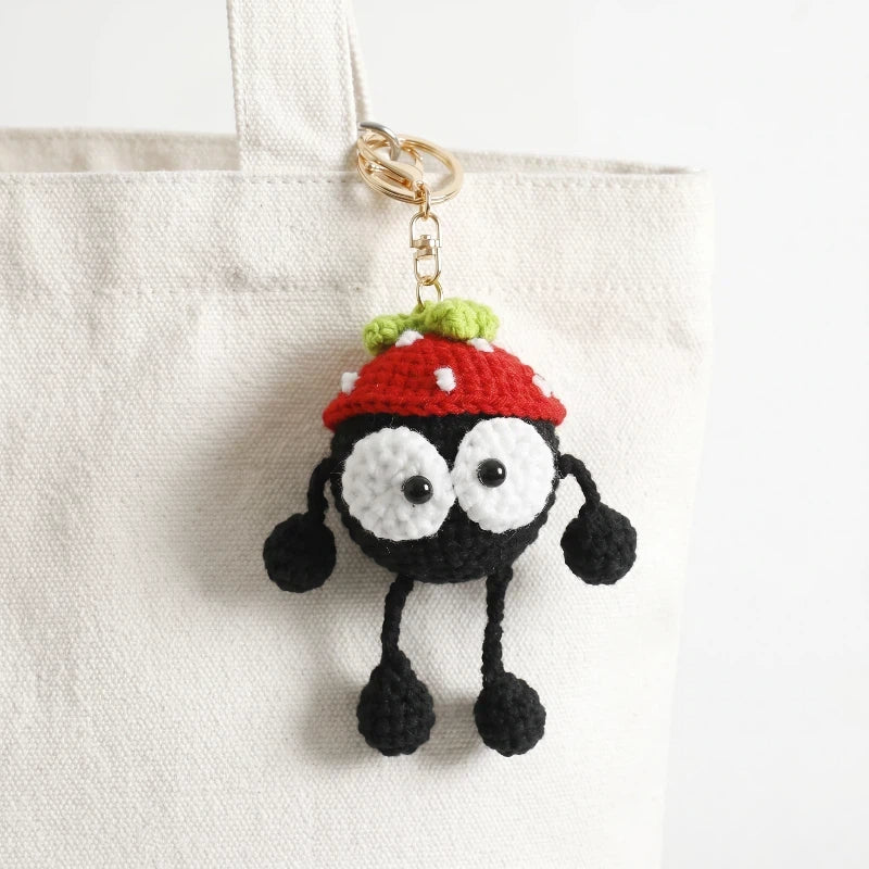 Gehäkelter „Black Coal Ball“ Taschenanhänger