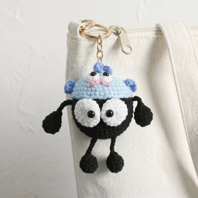Gehäkelter „Black Coal Ball“ Taschenanhänger
